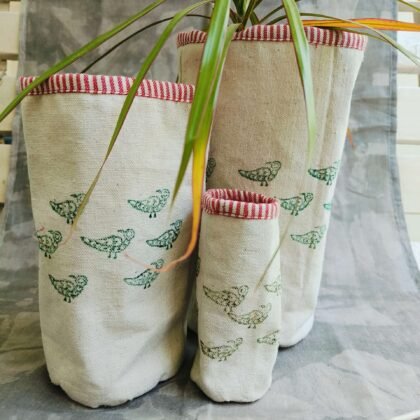 Green tiny parrots with stripes piping