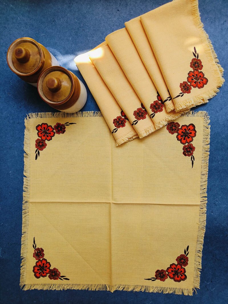 Table mat and napkin set in hand woven and block prints