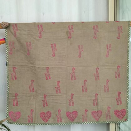 heart and giraffe print quilt