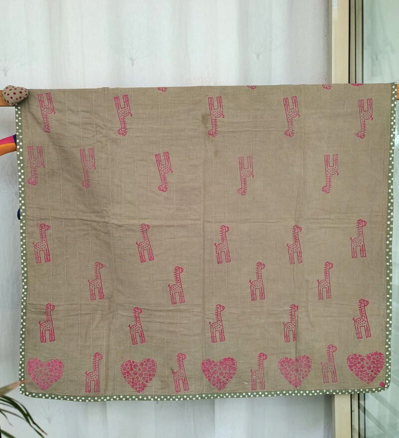 heart and giraffe print quilt