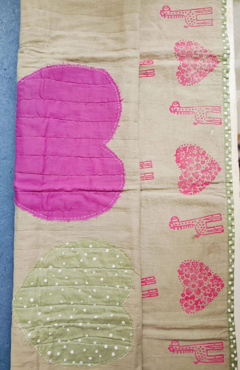 heart and giraffe print quilt